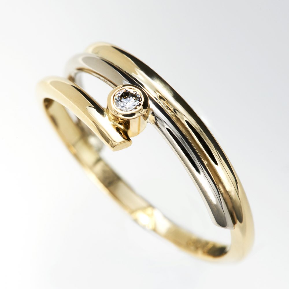 Gold and white gold ring with diamond