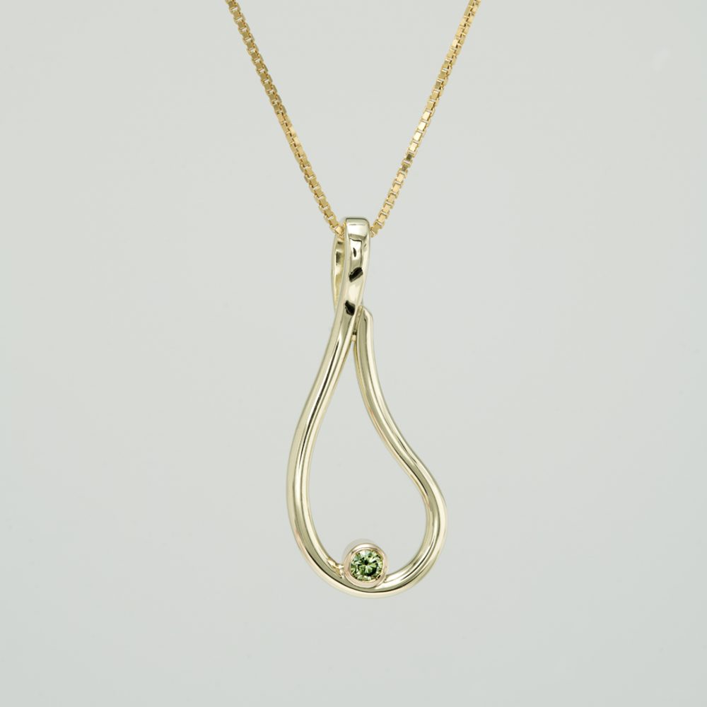 Gold necklace with green diamond "droplet"
