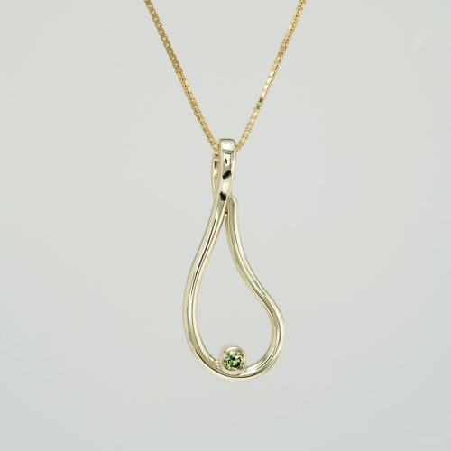 Gold necklace with green diamond "droplet"